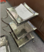 three-layer shelf with small square hammered plate